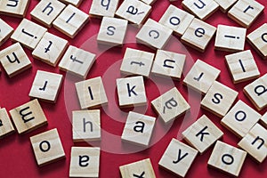 Alphabet letters on wooden scrabble pieces