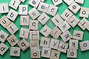 Alphabet letters on wooden scrabble pieces