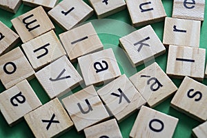 Alphabet letters on wooden scrabble pieces