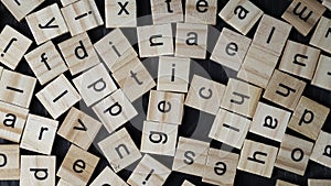 Alphabet letters on wooden scrabble pieces