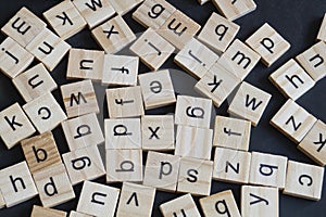 Alphabet letters on wooden scrabble pieces