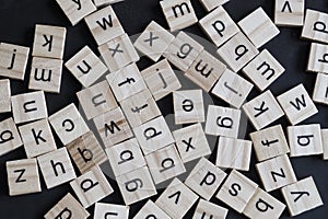 Alphabet letters on wooden scrabble pieces