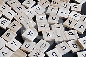 Alphabet letters on wooden scrabble pieces