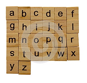 Alphabet letters a-z on wooden scrabble pieces, isolated on white background with clipping path