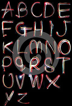 Alphabet light neon writing long exposure