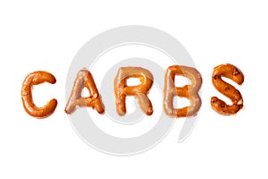 Alphabet pretzel written word CARBS isolated