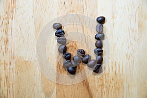 Alphabet 'W' make from coffee bean