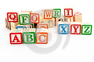 Alphabet wooden blocks with ABC alphabets selective focused isolated on white background