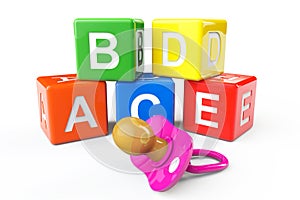 Alphabetical blocks and pacifier