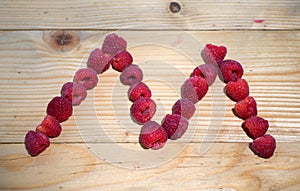 Alphabetical letter made of raspberries