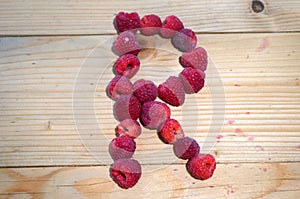 Alphabetical letter made of raspberries
