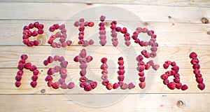 Alphabetical letters made of raspberries