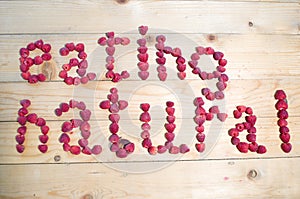 Alphabetical letters made of raspberries