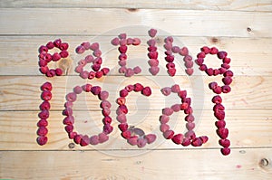 Alphabetical letters made of raspberries