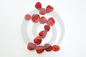 Alphabetical letters made of raspberries