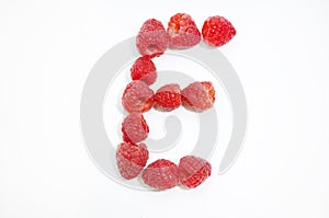 Alphabetical letters made of raspberries