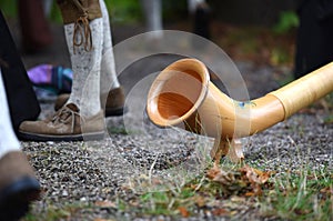 The `alphorn` is a wooden musical instrument