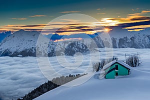 Alpin hut in the snow photo