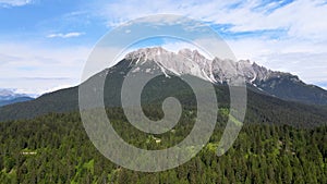 Alpin landscape with beautiful mountains in summertime, view from drone