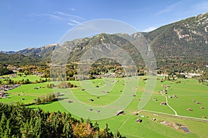 Alpine aerial view of Bavarian valley with green pastureland