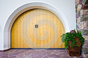 Alpine architecture - arched garage door photo