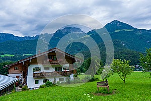 Alpine Chalet In The German Alps green glass and rainy day