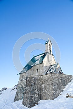 Alpine Chapel Against a Deep Blue Sky II