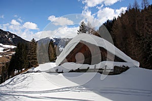 Alpine cottage in the winter