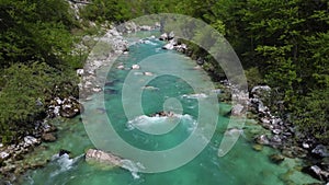 Alpine emmerald river soca in slovenian alps 4k aerial view - fresh water concept