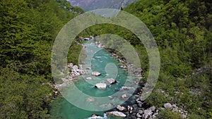 Alpine emmerald river soca in slovenian alps 4k aerial view - fresh water concept