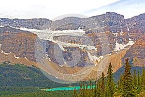 Alpine Glacier High on an Eroded Mountain Ridge