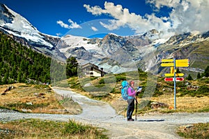 Alpine hiking trails with hikers,Zermatt,Switzerland,Europe photo