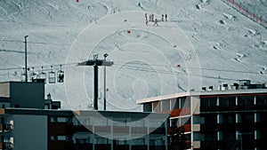 Alpine hotels and skiing slopes in Alpe d'Huez ski resort, France photo