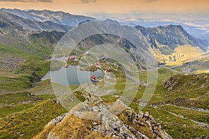 Alpine lake and curved road in mountains,Transfagarasan,Fagaras mountains,Carpathians,Romania