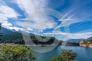 Alpine lake with dam - Lago di Paneveggio Trentino Alto Adige Italy