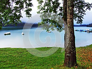 Alpine lake Klontalersee in Klontal valley and mountain range Glarus Alps