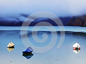 Alpine lake Klontalersee in Klontal valley and mountain range Glarus Alps