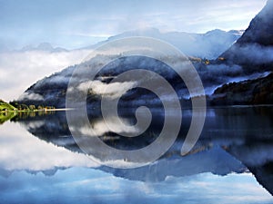 Alpine lake Klontalersee in Klontal valley and mountain range Glarus Alps