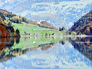 Alpine lake Klontalersee in Klontal valley and mountain range Glarus Alps