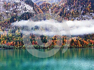 Alpine lake Klontalersee in Klontal valley and mountain range Glarus Alps