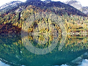Alpine lake Klontalersee in Klontal valley and mountain range Glarus Alps