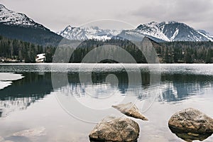 Alpine lake and mountains in winter