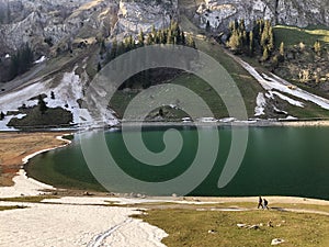 Alpine lake Seealpsee in the Alpstein mountain range and in the Appenzellerland region