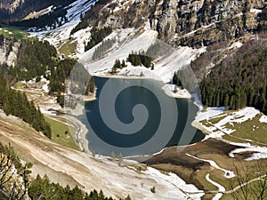 Alpine lake Seealpsee in the Alpstein mountain range and in the Appenzellerland region