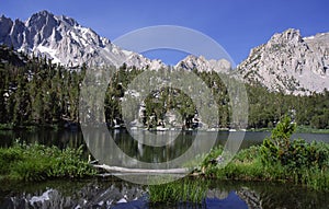 Alpine lake in Sierra Nevada photo