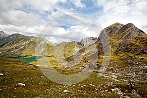 Alpine lake surrounded with rocks