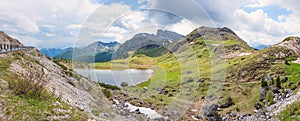 alpine lake Valparolasee, near the Valparolapass road, italian landscape south-tyrol