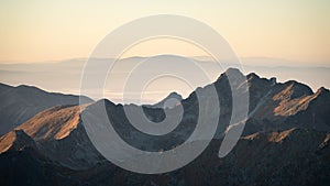 Alpine landscape with mountain ranges, peaks catching last light during sunset, Europe, Slovakia