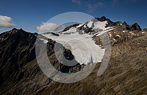 Alpine landscape panorama of glacier ice on summit of Mount Brewster Southern Alps seen from Mount Armstrong New Zealand photo