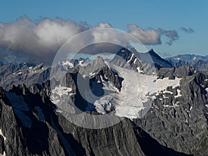 Alpine landscape panorama of glacier ice on summit of Mount Brewster Southern Alps seen from Mount Armstrong New Zealand photo